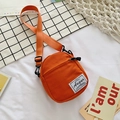 Mini orange canvas crossbody bag with front zipper pocket and adjustable strap - Orange