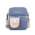 Greyish blue canvas crossbody bag with cartoon bear patch and adjustable shoulder strap - Blue
