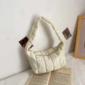 Creamy white quilted puffy shoulder bag with diamond stitching and minimalist design - White