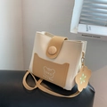 Chic two-tone bucket bag in cream and khaki with cute cartoon bear and floral charm - Khaki