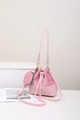 Detail of pink bucket bag set with drawstring closure and golden chain strap - Pink