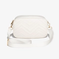 White crossbody camera bag with V-shaped quilting and wide adjustable fabric strap - White