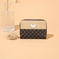 Short zipper wallet featuring clover patterns, butterfly clasp, and plush pompom charm - Apricot