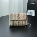 Rainbow woven straw crossbody bag with gold cat-ear lock and pearl charms details - Color 1
