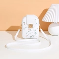 Close-up of white crossbody phone bag featuring exquisite floral embroidery and gold snap - White