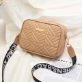 Beige quilted camera bag with lettered wide strap and golden metal plate accent - Brown