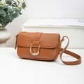 Chic caramel brown leather shoulder bag featuring a stylish gold U-shaped metal buckle - Brown