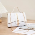 Elegant white crocodile pattern handbag with gold tassel and chain shoulder strap - White