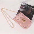 Pink vintage PU leather mini crossbody bag with gold chain strap and floral pattern - Pink
