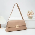 Minimalist beige shoulder bag with a sleek gold twist lock in a clean studio setting - Pink
