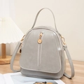 Mochila pequeña gris de cuero encerado para mujer con cremalleras de aro doradas - Gris
