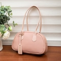 Elegant pink lychee leather Boston shoulder bag with top handles and fashion hangtag - Pink