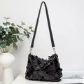 Chic black sequin shoulder bag with leather strap and golden hardware accents - Black