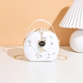 Bolso bandolera blanco redondo con bordado floral y colgante de gato dorado - Blanco