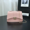 Pink crocodile pattern handbag with gold chain strap and structured flap design - Pink