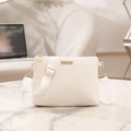 White minimalist crossbody bag with quilted texture and wide fabric shoulder strap - White