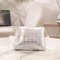 Silver quilted crossbody bag with adjustable white shoulder strap and gold hardware accents - Silver