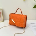 Orange crossbody bag with diamond quilting and elegant gold chain strap detail - Orange
