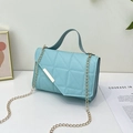 Sky blue quilted women handbag with gold metal bar detail and elegant chain strap - Blue