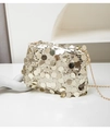 Detail of shimmering gold sequin evening bag with a metallic chain strap on white background - Gold