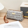 Light gray faux leather clutch bag with brown BAKM monogram print and wrist strap - Grey-brown
