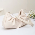 Chic beige pleated crescent shoulder bag with minimalist faux leather finish - Light Beige