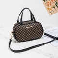 Retro black crossbody bag with golden clover monogram pattern and adjustable strap - Black Polka Dot