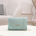 Chic mint blue chain shoulder bag with black and white clover print and gold logo - Green