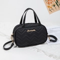 Black wavy quilted messenger bag with gold logo and adjustable shoulder strap - Black Wave