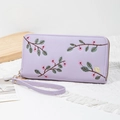 Long lavender zipper wallet in lychee leather with floral embroidery and wrist strap - Purple