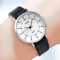Classic quartz watch with large silver case and black leather strap worn on wrist - Silver Case White Dial Black Strap