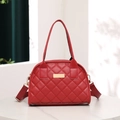 Red quilted Boston handbag with golden hardware and adjustable crossbody strap - Red