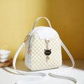Mini white leather backpack for women with yellow dots and black cat pendant - White