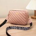 Pink quilted PU leather crossbody bag with wide embroidered shoulder strap and gold hardware - Pink