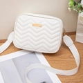 White wave quilted camera bag for women with gold hardware and wide shoulder strap - White