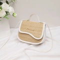 Chic woven straw handbag with white leather trim and elegant gold logo detail - White