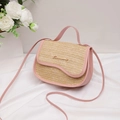 Straw saddle bag with pink leather trim and elegant gold cursive metal hardware - Pink