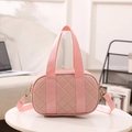 Pink quilted Boston handbag for women with adjustable strap and diamond lattice pattern - Pink