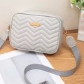 Light grey quilted crossbody bag with golden hardware and wide fabric strap for women - Gray