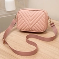 Pink quilted crossbody camera bag with wide fabric strap and golden hardware - Pink