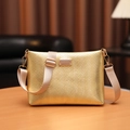 Golden crossbody bag featuring V-shaped embossed texture and adjustable fabric strap - Gold Striped Buckle