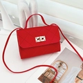 Classic red quilted crossbody bag with gold metallic turn-lock and matching strap - Red