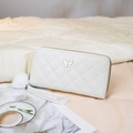 White quilted long wallet with double zipper, metal butterfly and fluffy pompom detail - White