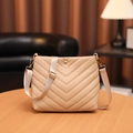 Quilted beige bucket bag for women with adjustable fabric shoulder strap in light gold - Khaki