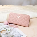 Pink quilted long wallet for women with metal butterfly bow and plush fur ball charm - Pink