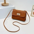 Brown quilted crossbody bag with gold square clasp and slender shoulder strap - Brown