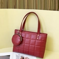 Red quilted leather tote bag with a matching small round coin purse and gold hardware - Red