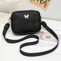 Chic black quilted camera bag with butterfly logo and wide shoulder strap for women - Black