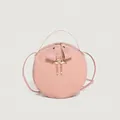 Pink woven leather round crossbody bag with swan charm and bow decoration - Pink