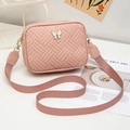 Pink woven pattern crossbody bag with a white enamel butterfly and wide strap - Pink